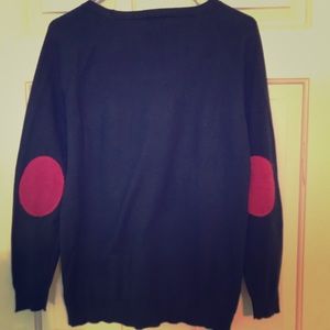 Navy sweater with pink elbow pads